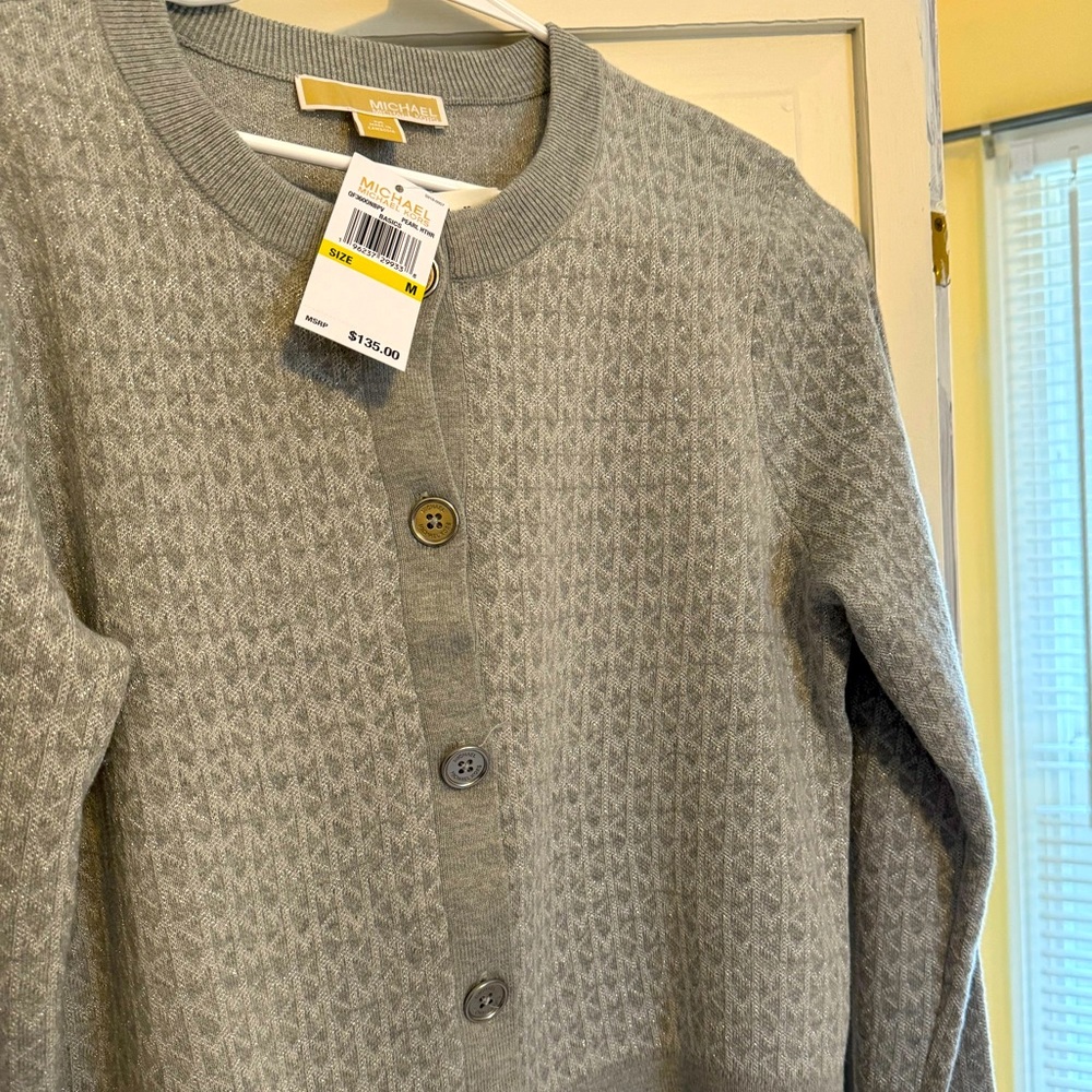 Silver Michael kors sweater. This elegant top is completely new. Size M.